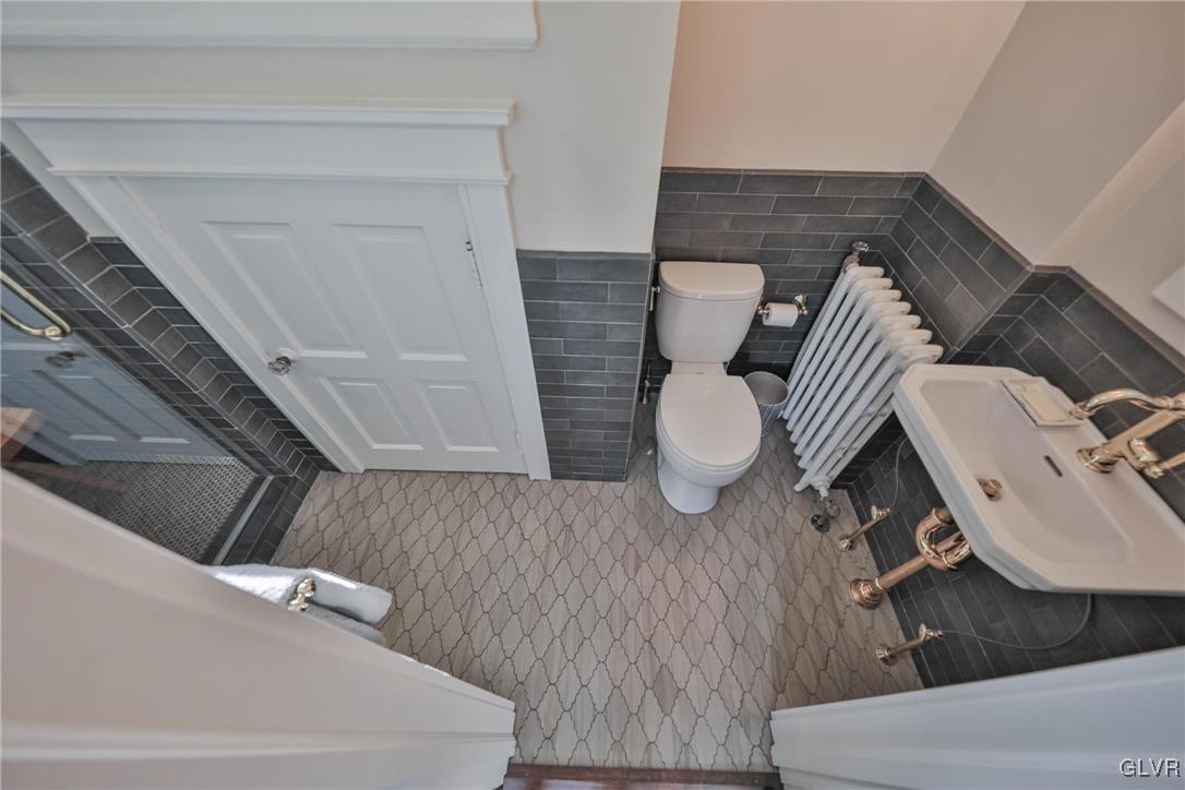 837 Tioga Avenue Bethlehem, PA 18018 - Photo 26 of 50 a bathroom with a sink and toilet