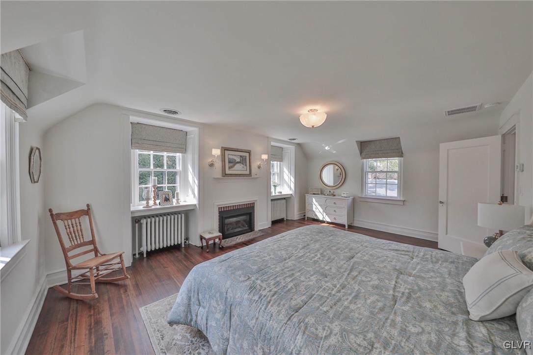 837 Tioga Avenue Bethlehem, PA 18018 - Photo 34 of 50 a bed room with a bed and a chair