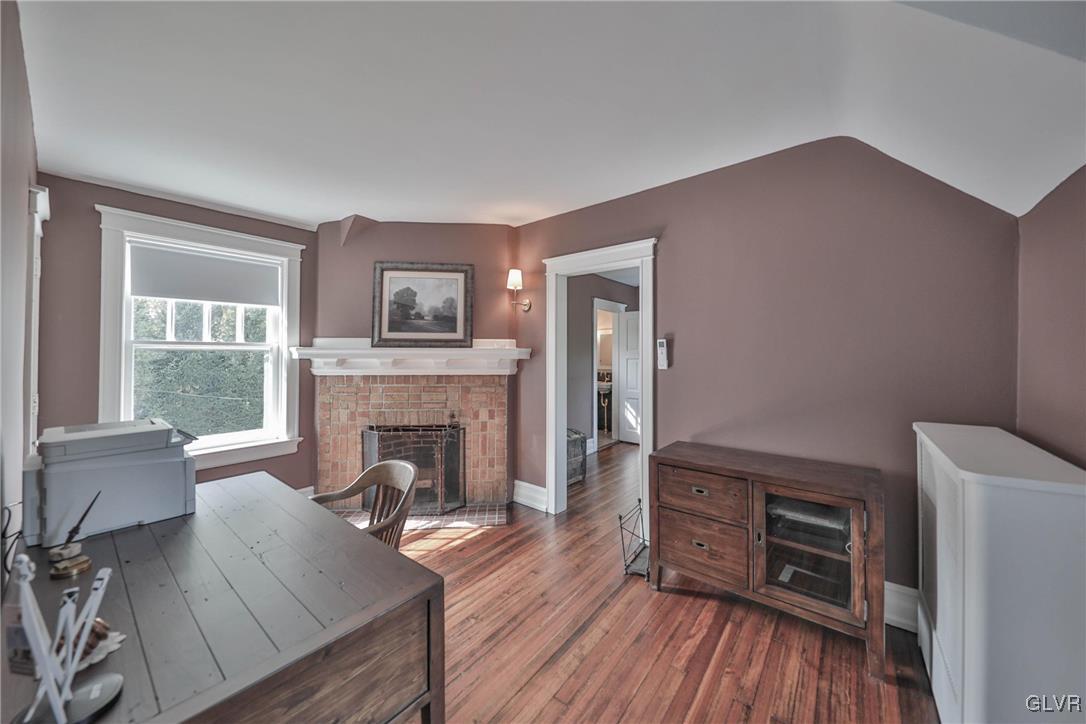 837 Tioga Avenue Bethlehem, PA 18018 - Photo 38 of 50 a living room with furniture and a fireplace