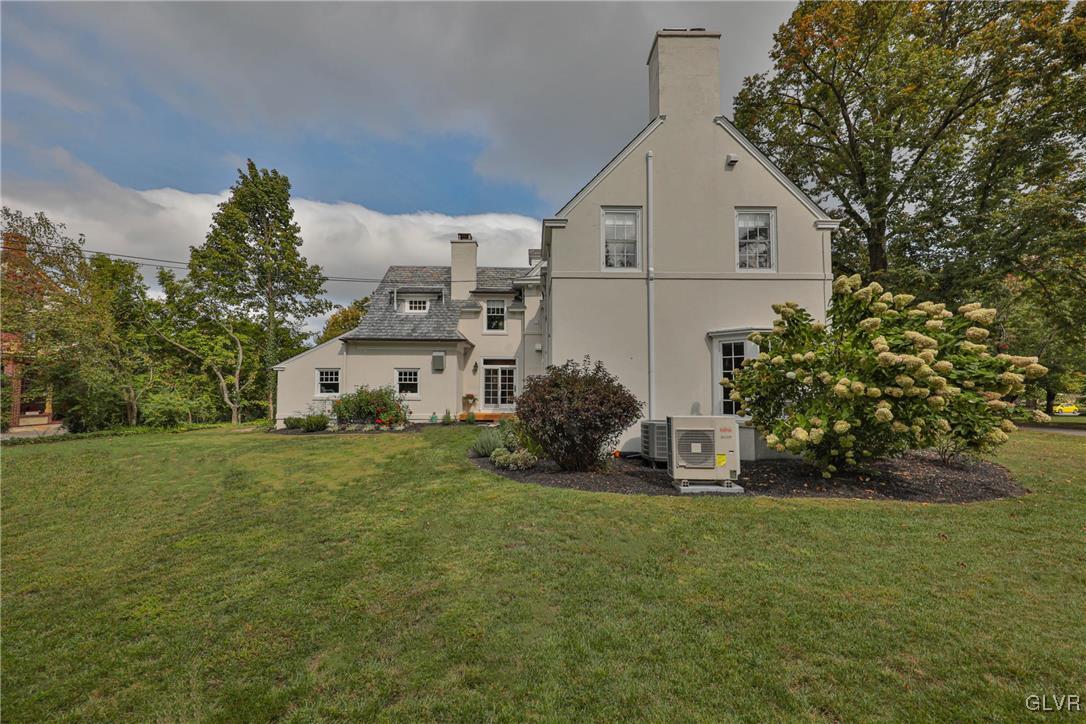 837 Tioga Avenue Bethlehem, PA 18018 - Photo 50 of 50 a view of a white house that has a small yard and large trees
