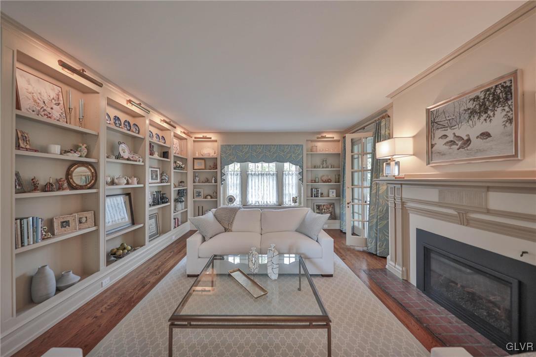 837 Tioga Avenue Bethlehem, PA 18018 - Photo 8 of 50 a living room with furniture and a fireplace