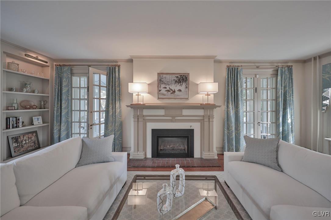 837 Tioga Avenue Bethlehem, PA 18018 - Photo 9 of 50 a living room with furniture and a fireplace
