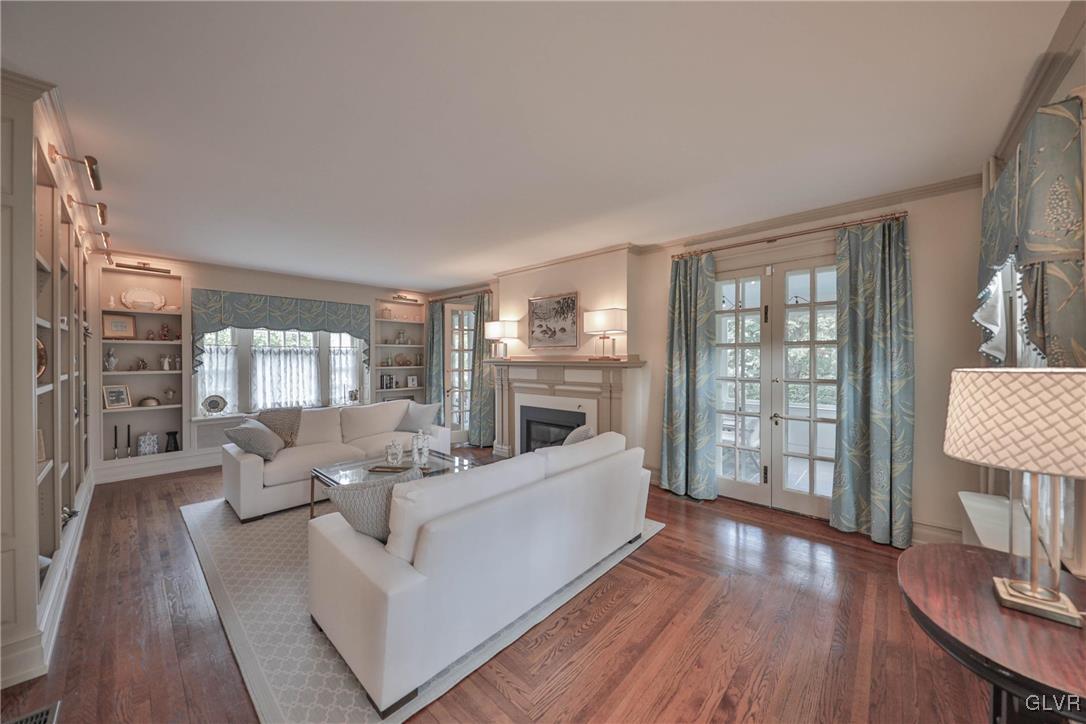 837 Tioga Avenue Bethlehem, PA 18018 - Photo 10 of 50 a living room with furniture large window and wooden floor