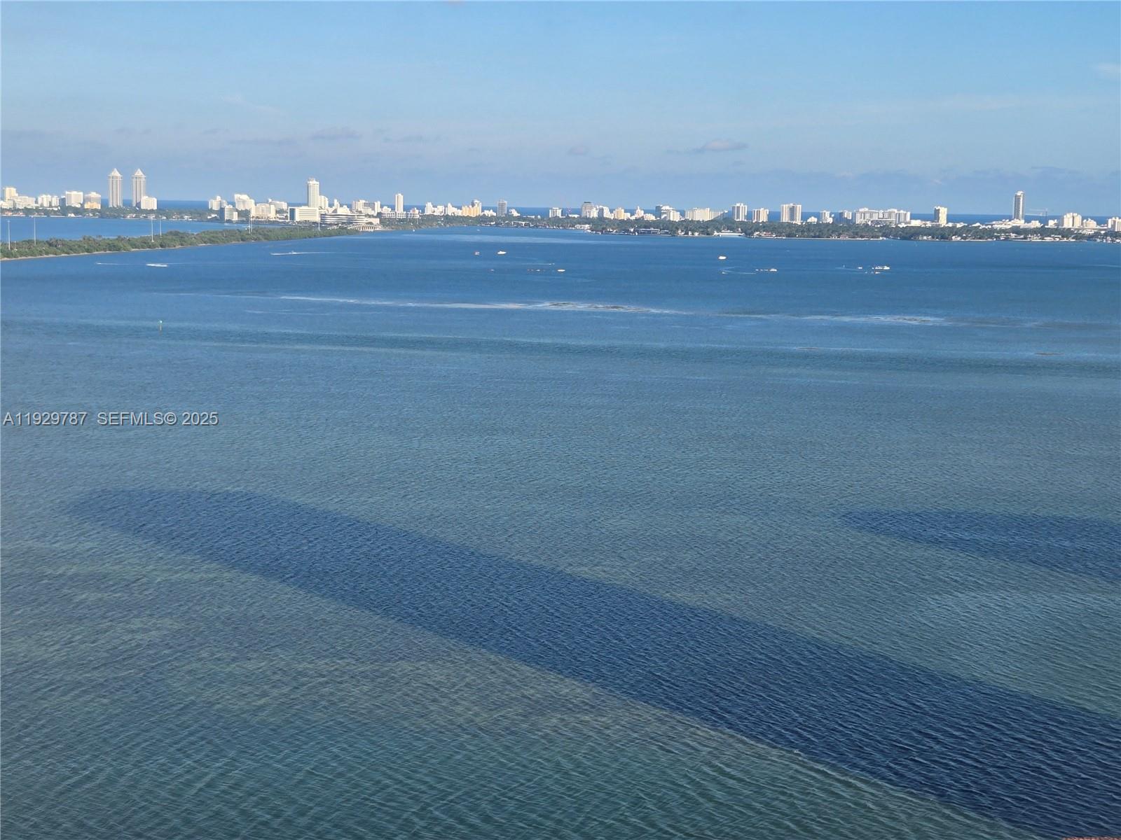460 Northeast 28th Street, Unit 2407 Miami, FL 33137 - Photo 29 of 50 a view of an empty room with a piano