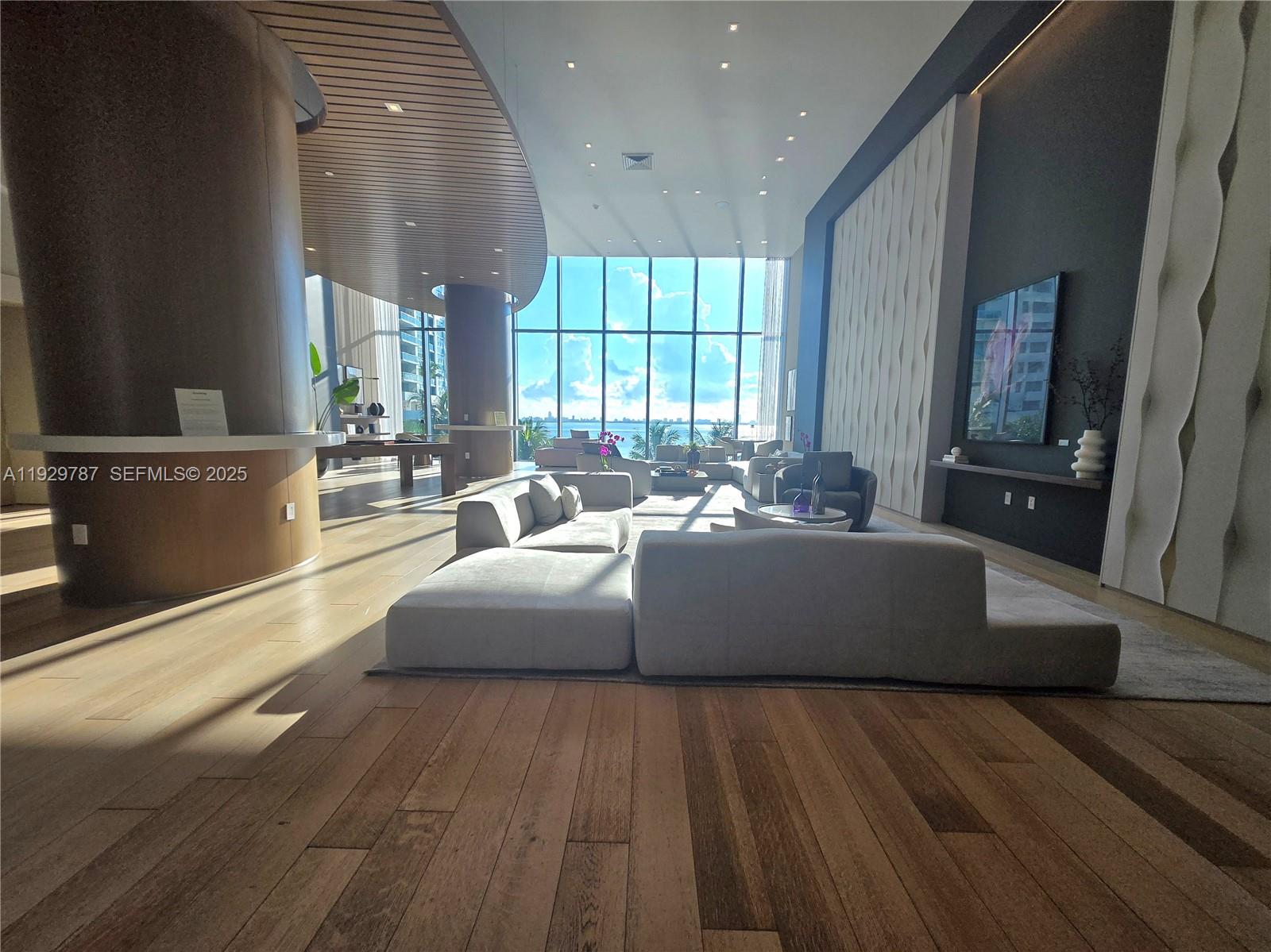 460 Northeast 28th Street, Unit 2407 Miami, FL 33137 - Photo 36 of 50 a living room with furniture and a large window