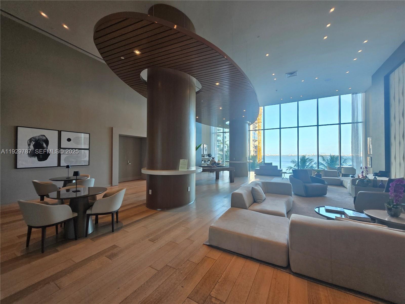 460 Northeast 28th Street, Unit 2407 Miami, FL 33137 - Photo 37 of 50 a living room with furniture and a large window