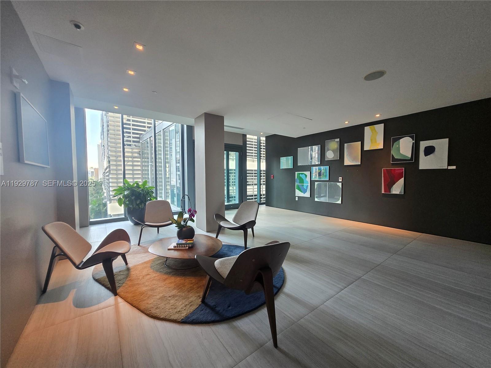 460 Northeast 28th Street, Unit 2407 Miami, FL 33137 - Photo 39 of 50 a living room with furniture and large window