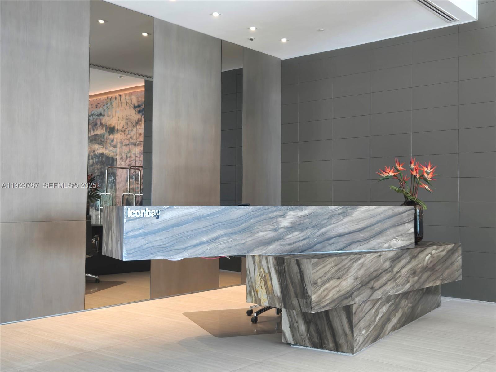 460 Northeast 28th Street, Unit 2407 Miami, FL 33137 - Photo 40 of 50 a dining room with a table and chairs