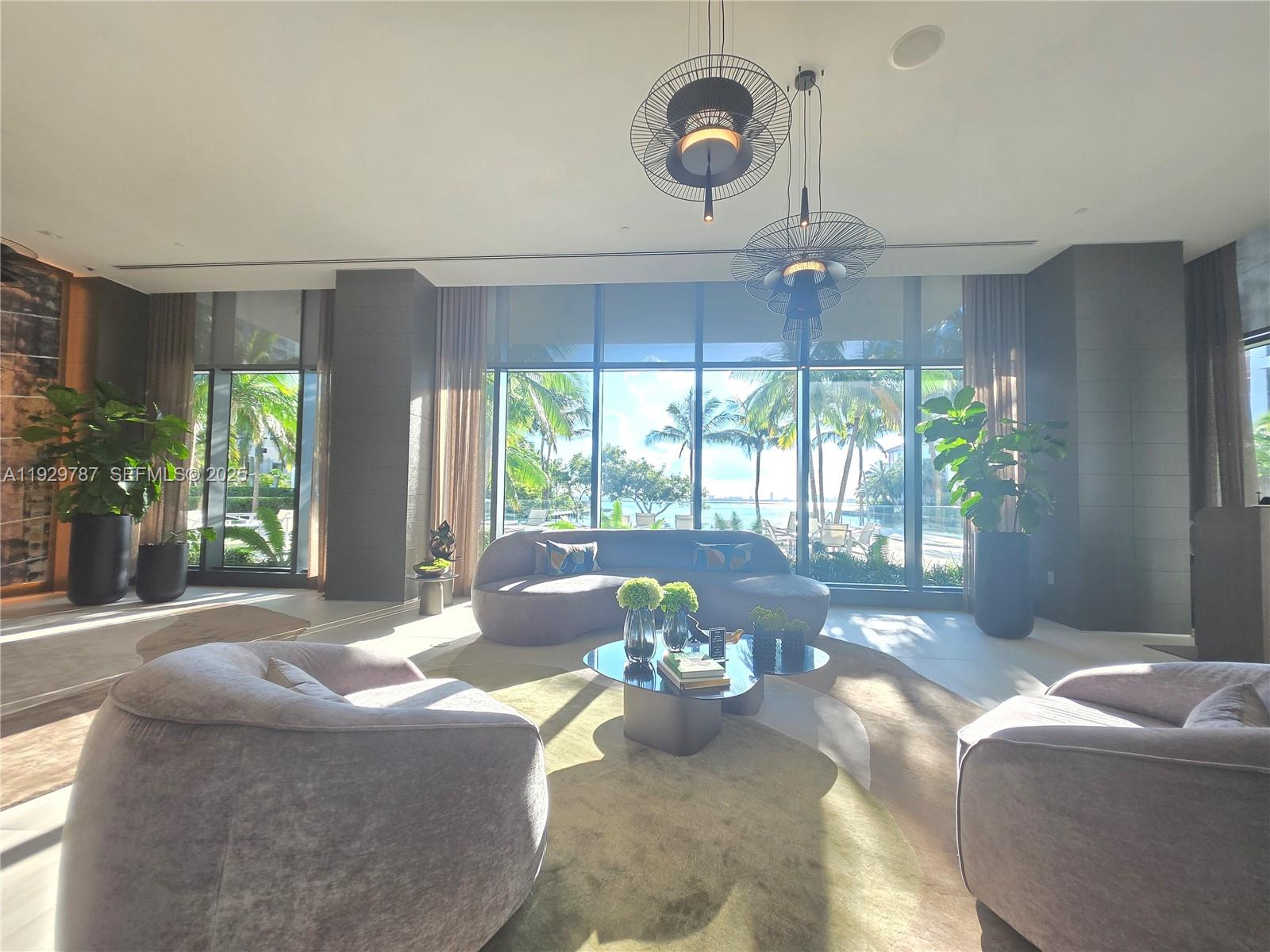 460 Northeast 28th Street, Unit 2407 Miami, FL 33137 - Photo 41 of 50 a living room with furniture and a large window