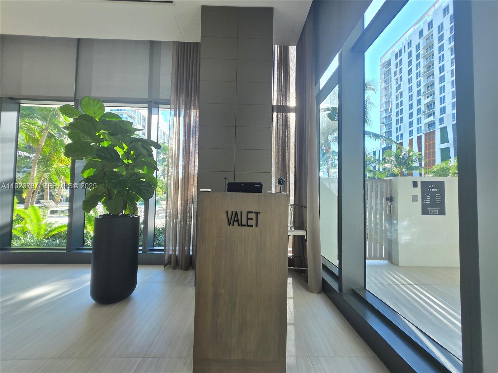 460 Northeast 28th Street, Unit 2407 Miami, FL 33137 - Photo 42 of 50 a view of a glass door and porch