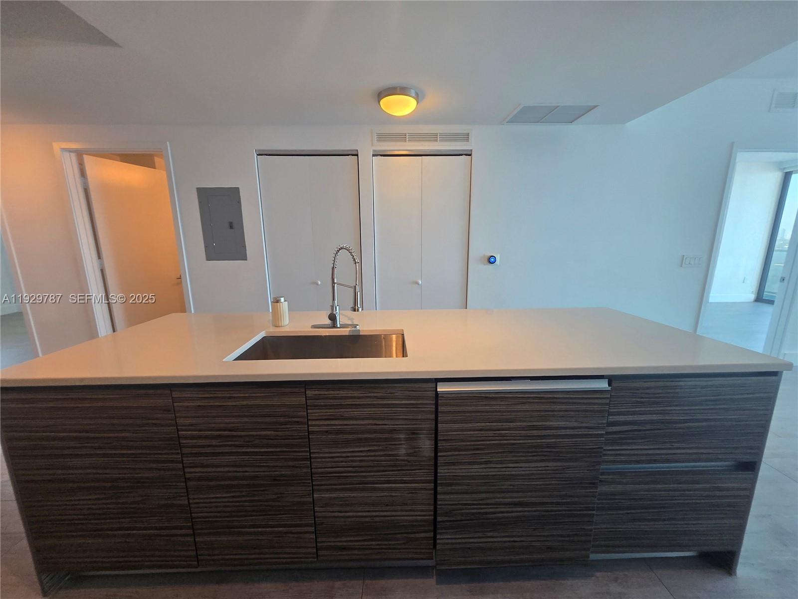 460 Northeast 28th Street, Unit 2407 Miami, FL 33137 - Photo 10 of 50 a bathroom with a sink and a mirror