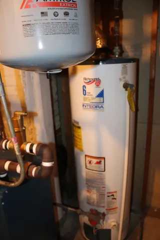 a bathroom with a shower and toilet