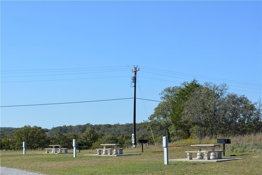 Lot 445 Ranchview Court Bowie, TX 76230 - Photo 17 of 17 a view of a park with large trees