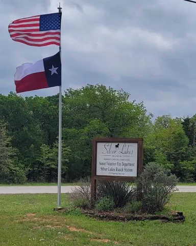 a view of a street with a sign board