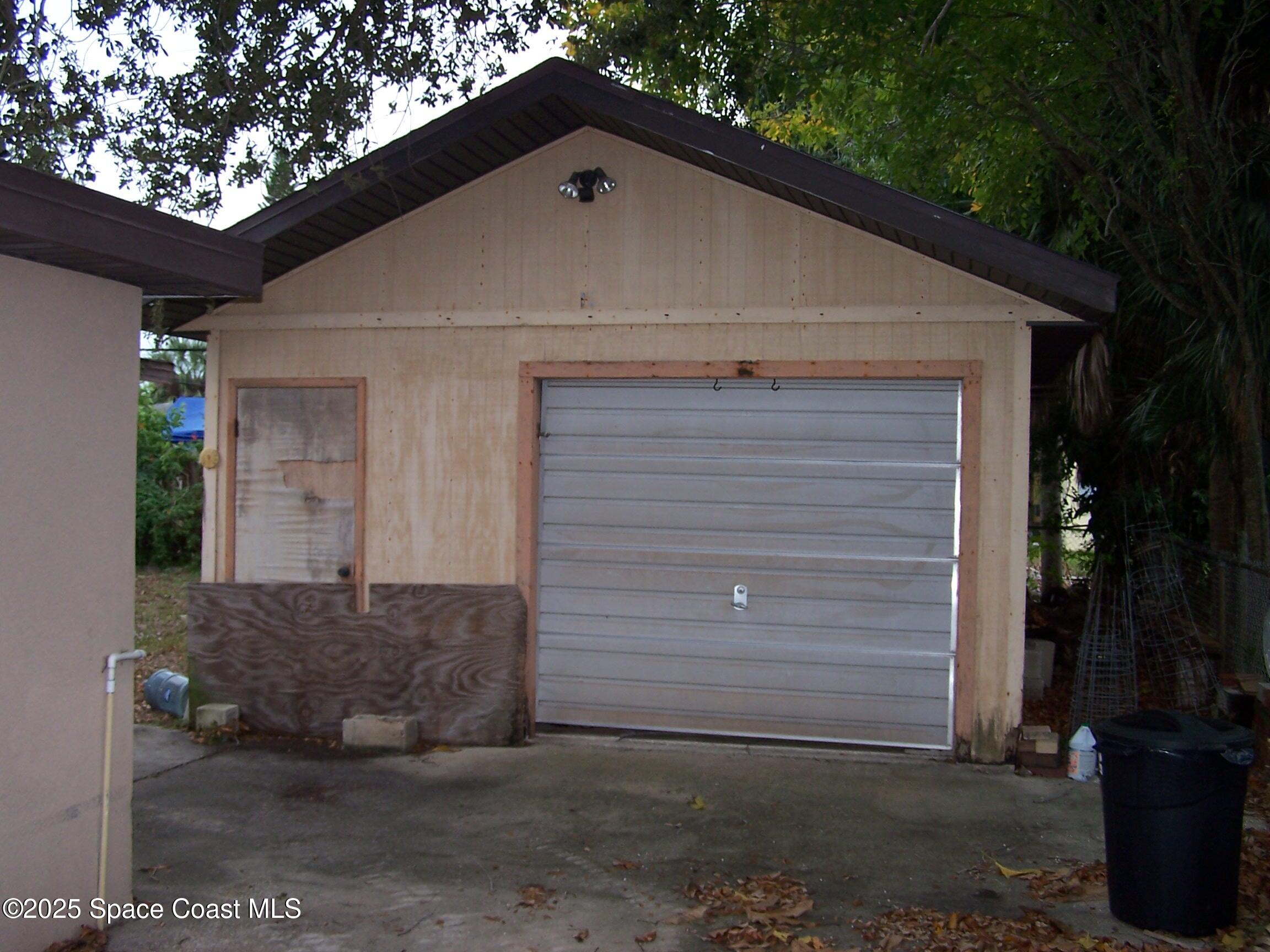 1545 Cunningham Avenue Merritt Island, FL 32952 - Photo 3 of 11 a front view of a house with a yard