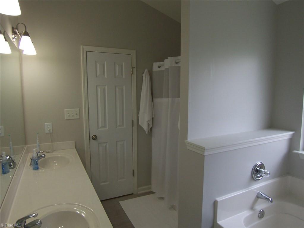4702 Ridgefall Road Greensboro, NC 27410 - Photo 13 of 27 Another view of the master bath.