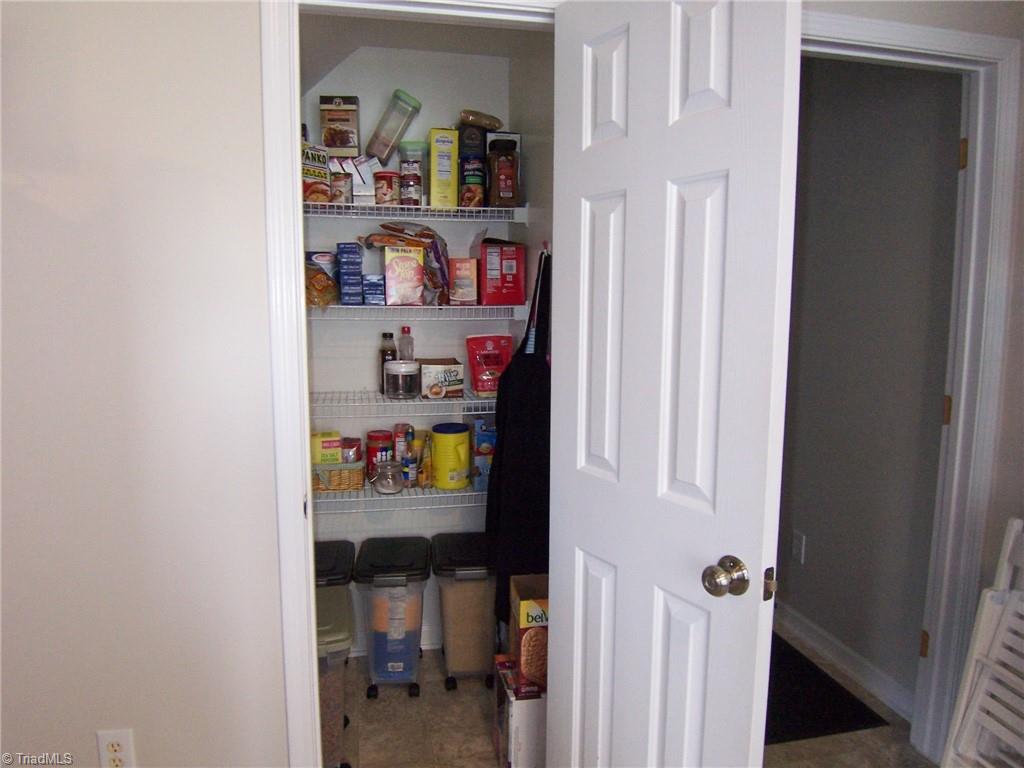 4702 Ridgefall Road Greensboro, NC 27410 - Photo 7 of 27 Pantry will hold all of your cooking goods.