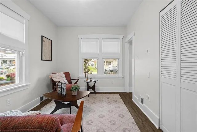 a bed room with a bed and a window