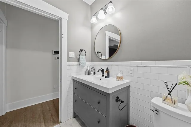 a view of a kitchen from the hallway
