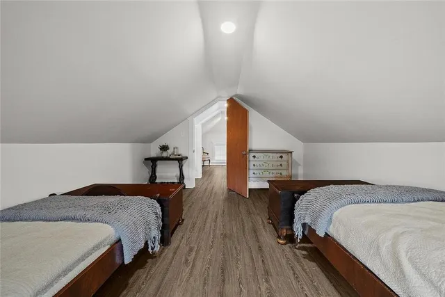 a view of empty room with wooden ceiling