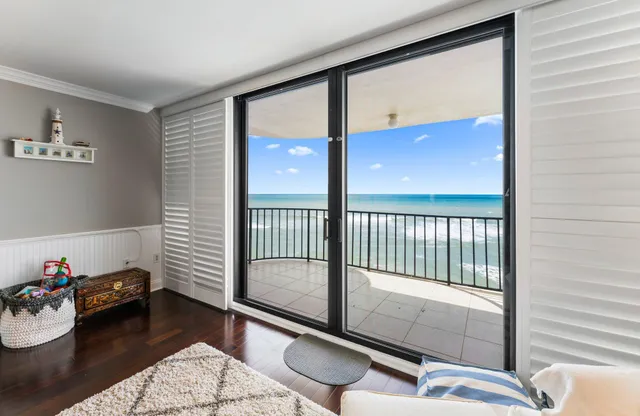 a bedroom with a bed and a television