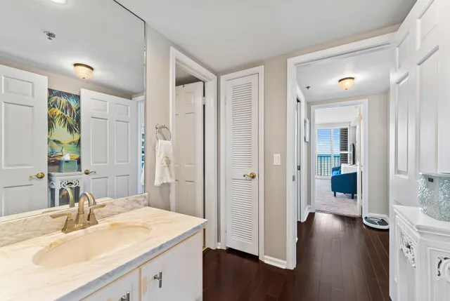 a white toilet sitting next to a shower curtain