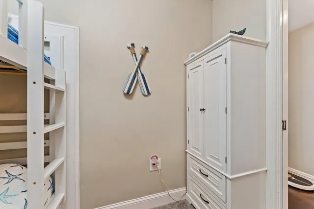 a view of a swimming pool with a table and chairs