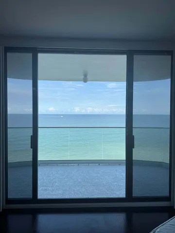 a kitchen with stainless steel appliances granite countertop a stove and cabinets
