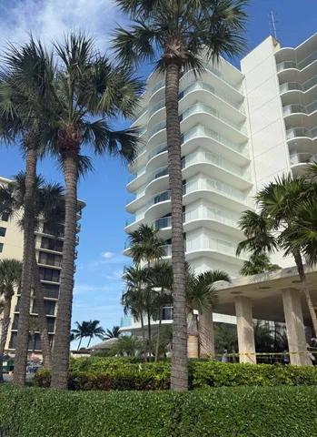 a living room with furniture dining room and wooden floor