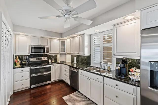 a view of a hallway with dining room and dining room view