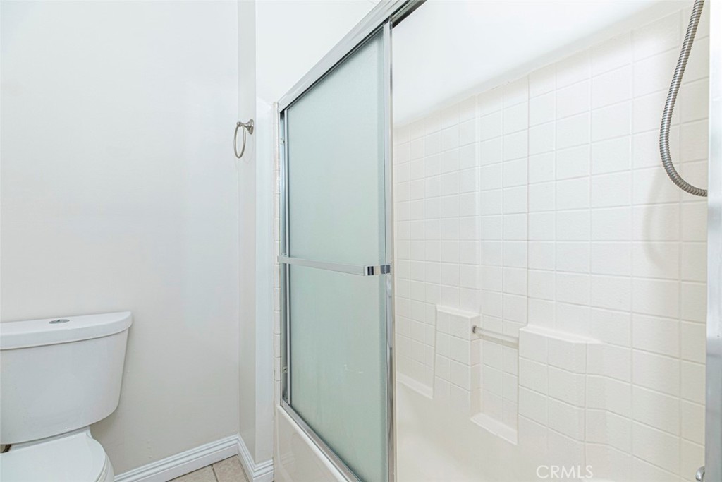 14319 Tiara Street, Unit 2 Van Nuys, CA 91401 - Photo 12 of 14 a bathroom with a toilet and a shower