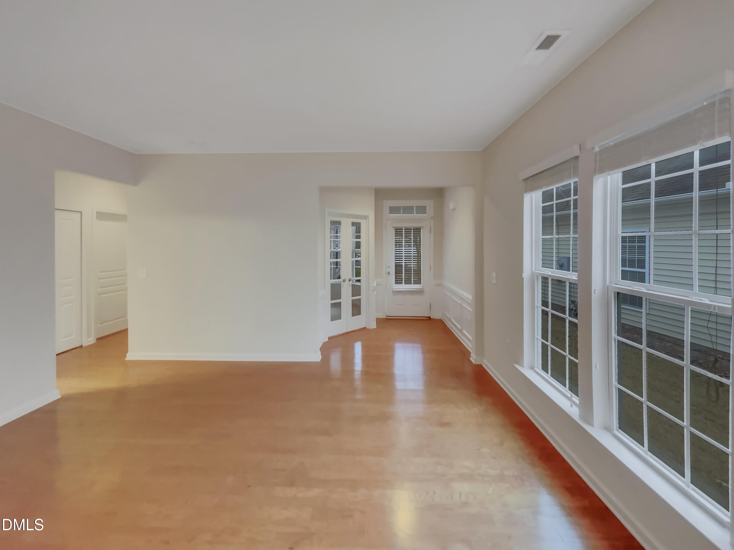 540 Tomkins Loop Cary, NC 27519 - Photo 4 of 19 a view of an empty room with a window