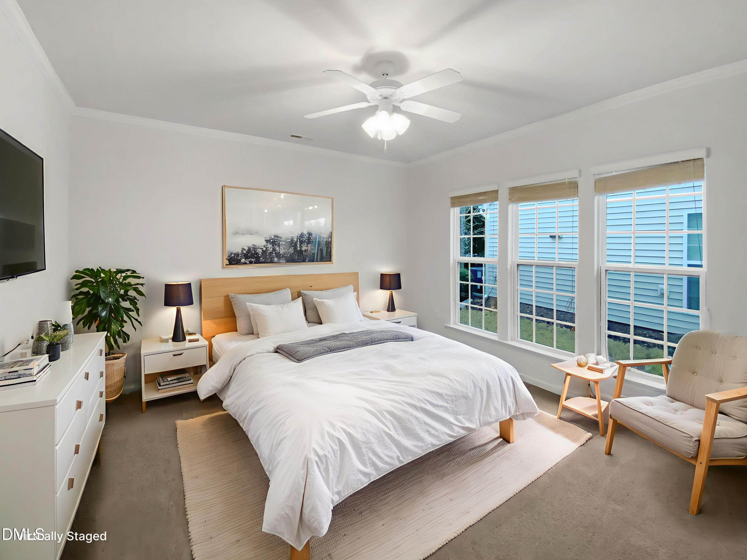 540 Tomkins Loop Cary, NC 27519 - Photo 10 of 19 a spacious bedroom with a bed and a couch