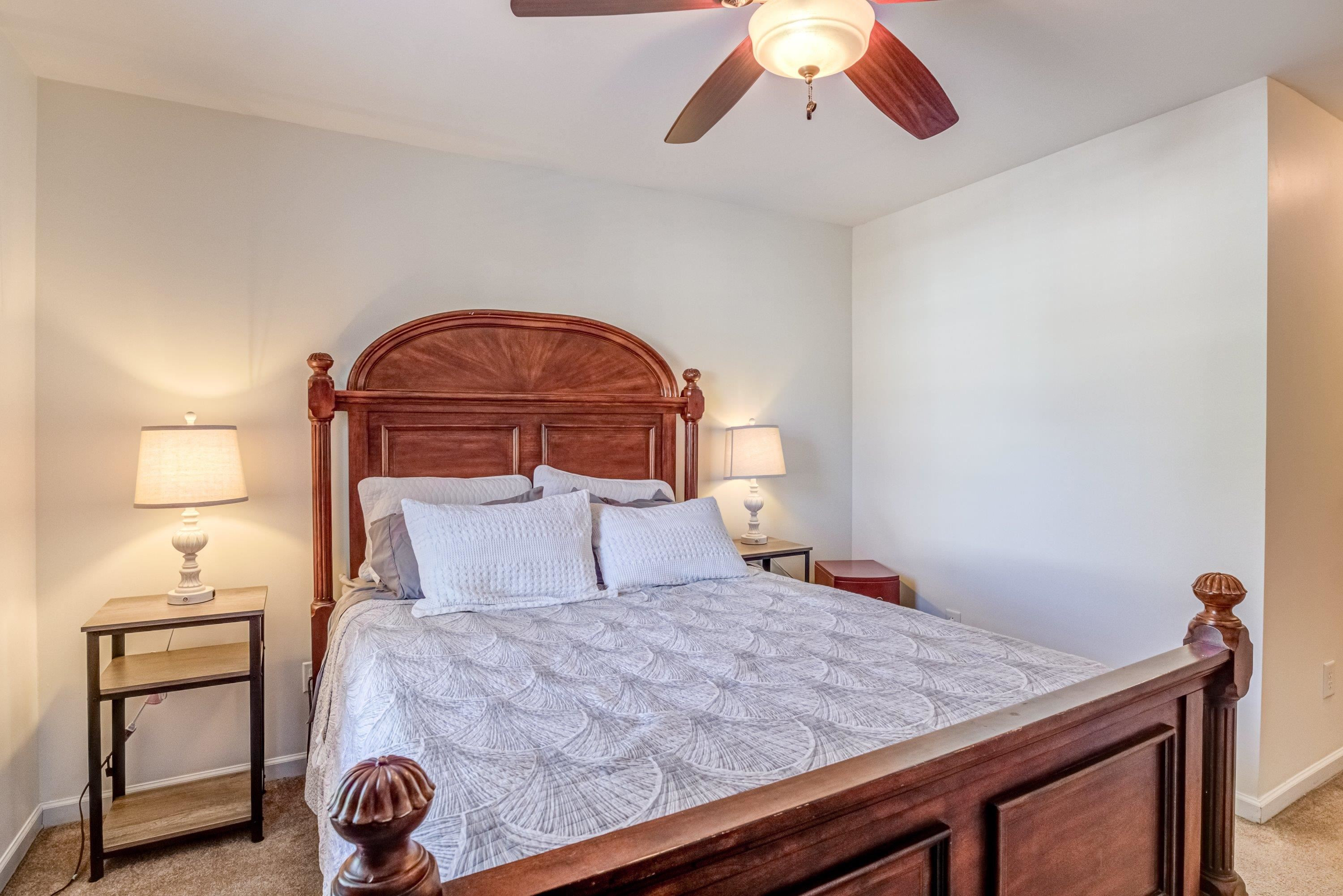 7726 Averette Field Drive Raleigh, NC 27616 - Photo 18 of 29 a bedroom with a bed and a dresser