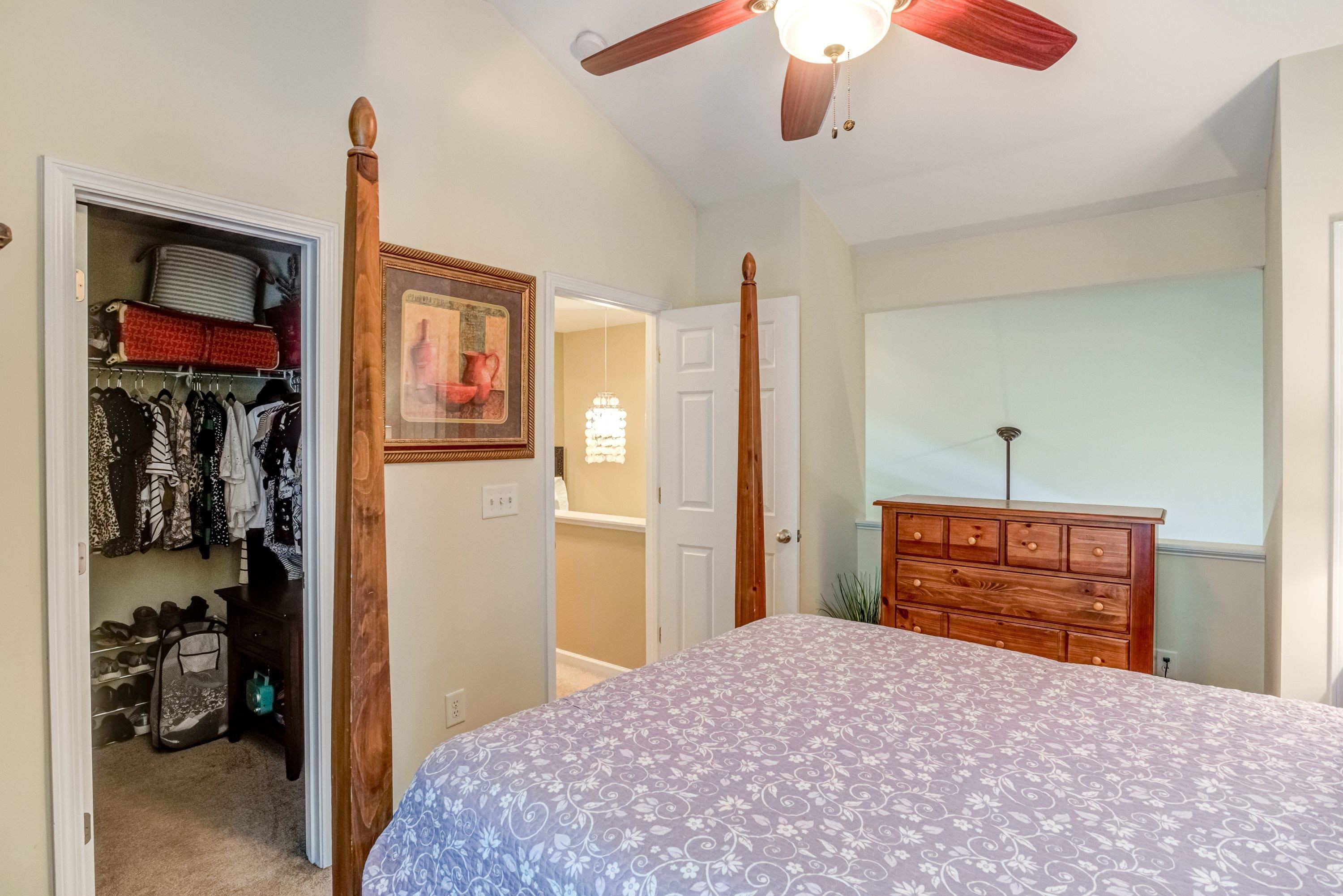 7726 Averette Field Drive Raleigh, NC 27616 - Photo 21 of 29 a bedroom with a bed and a dresser
