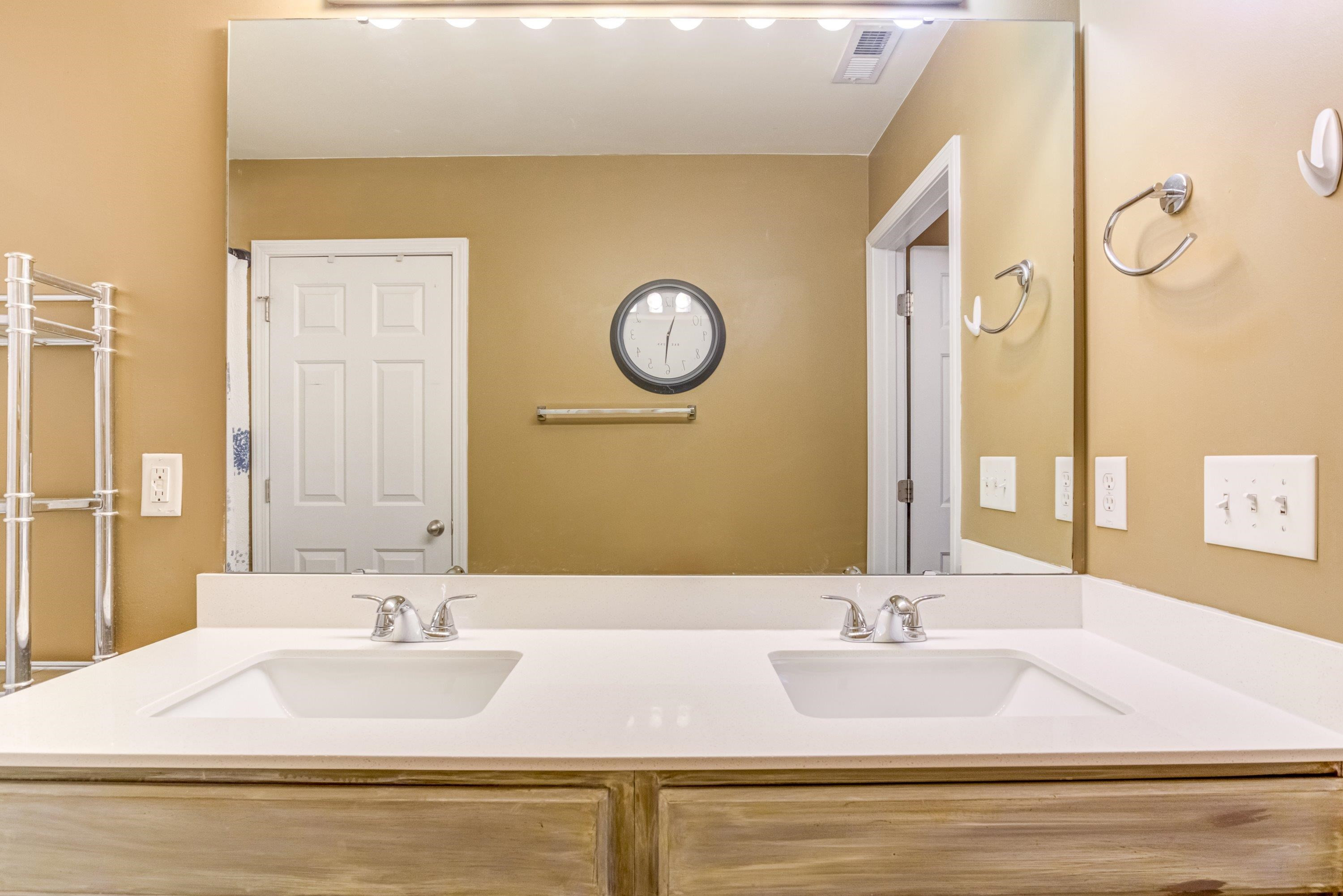 7726 Averette Field Drive Raleigh, NC 27616 - Photo 26 of 29 a bathroom with a sink and a mirror