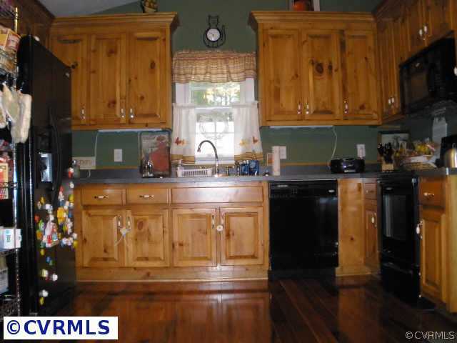 Other - Kitchen has upgraded cabinets and hardwood