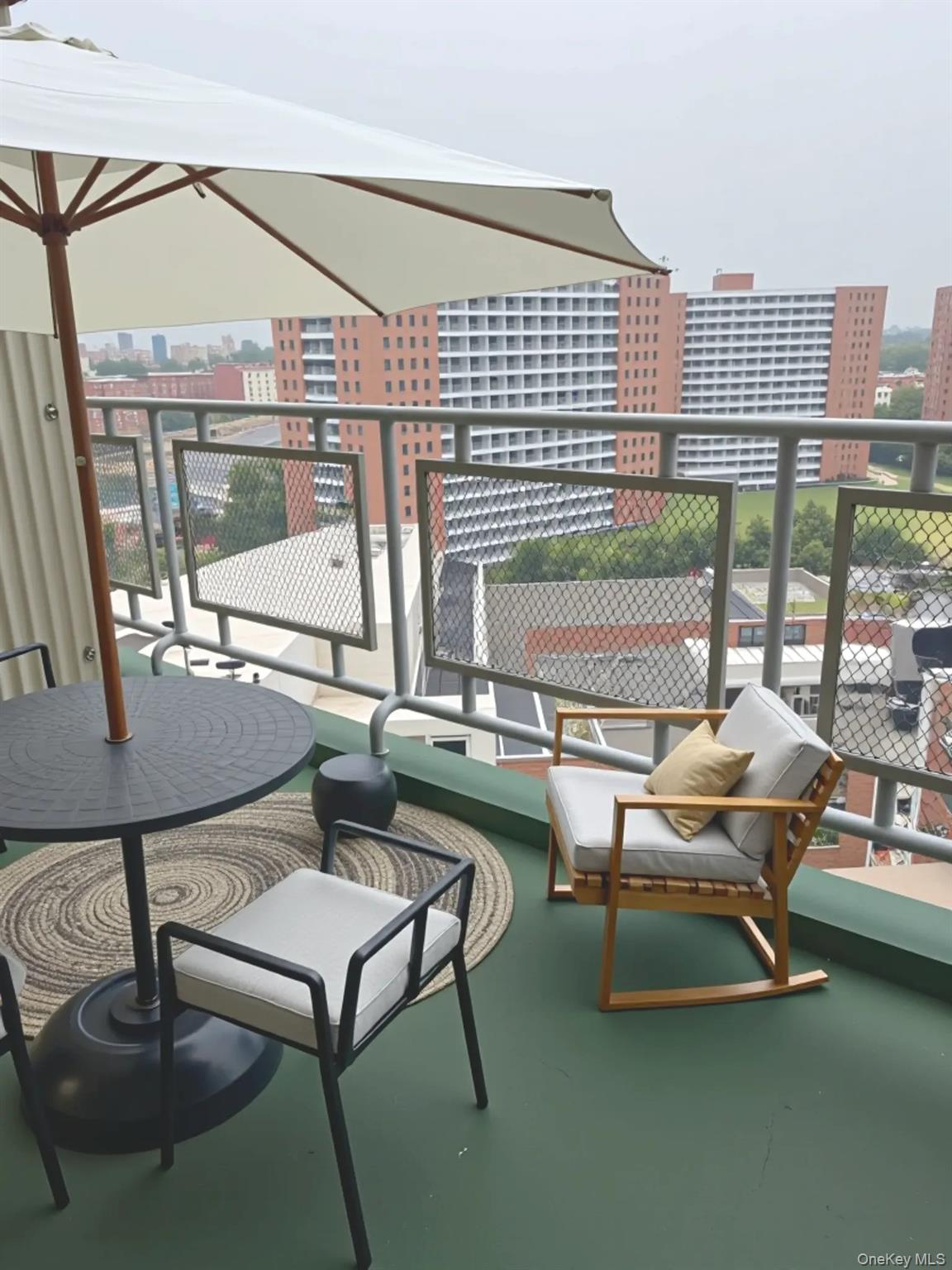 61-15 97th Street, Unit 12H Queens, NY 11374 - Photo 17 of 23 Balcony featuring a view of city