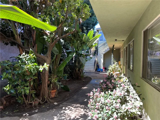 a view of a car park in front of house