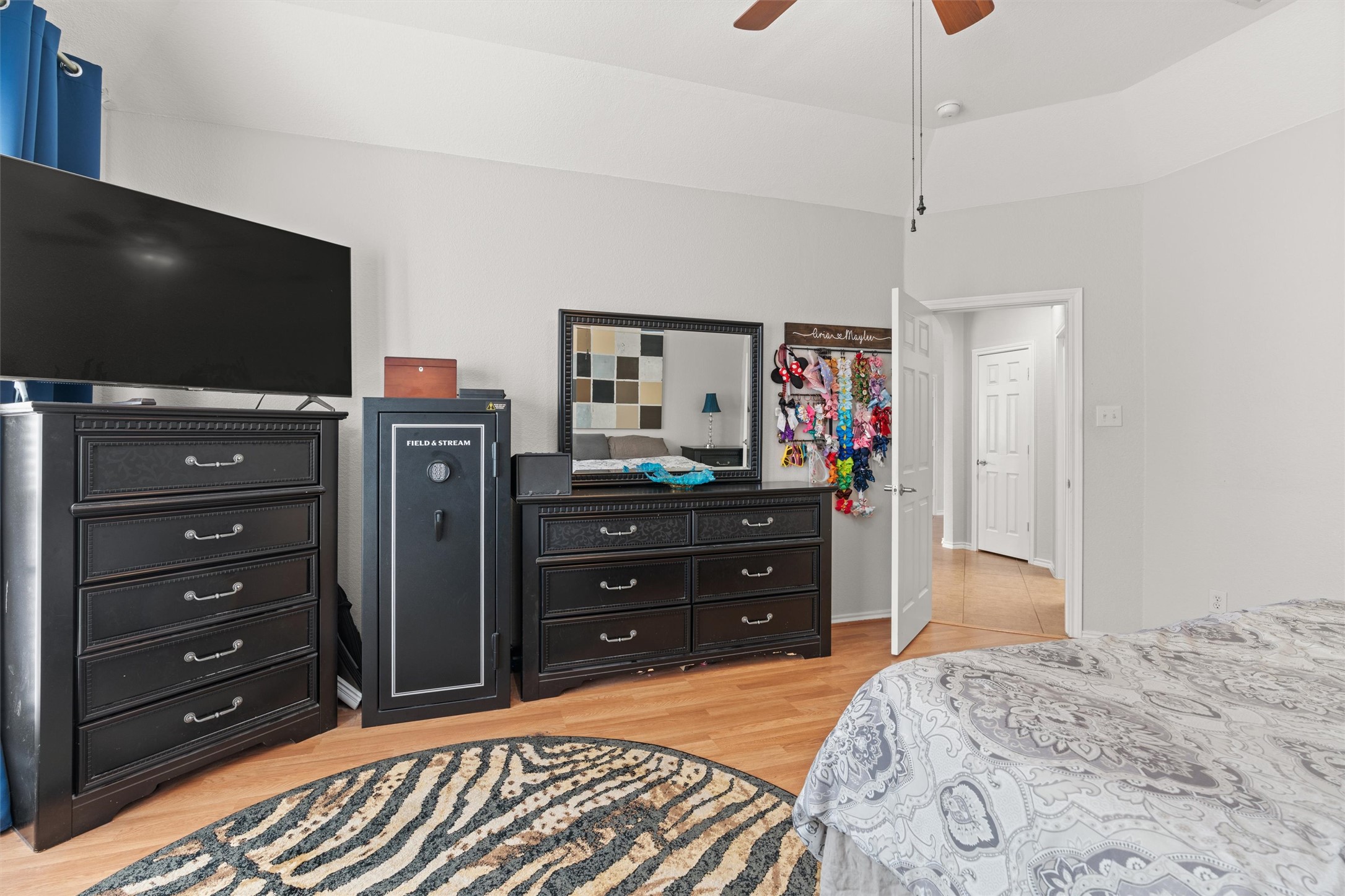 400 Red Hawk Drive Leander, TX 78641 - Photo 16 of 36 Bedroom featuring light wood-style floors and a ceiling fan