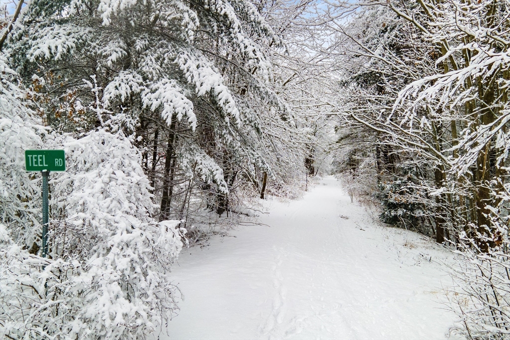 750 Teel Road Winchendon, MA 01475 - Photo 13 of 41 a view of water covered with snow in the background