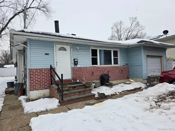 a view of a patio with a yard