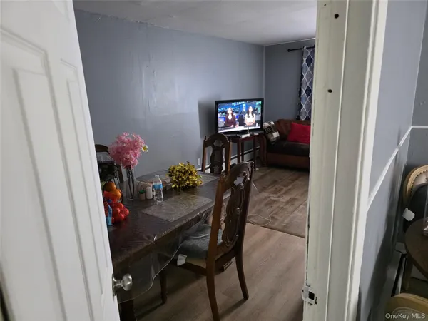 a view of a dining room and kitchen