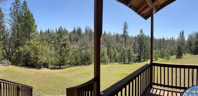 a view of a balcony with an outdoor space