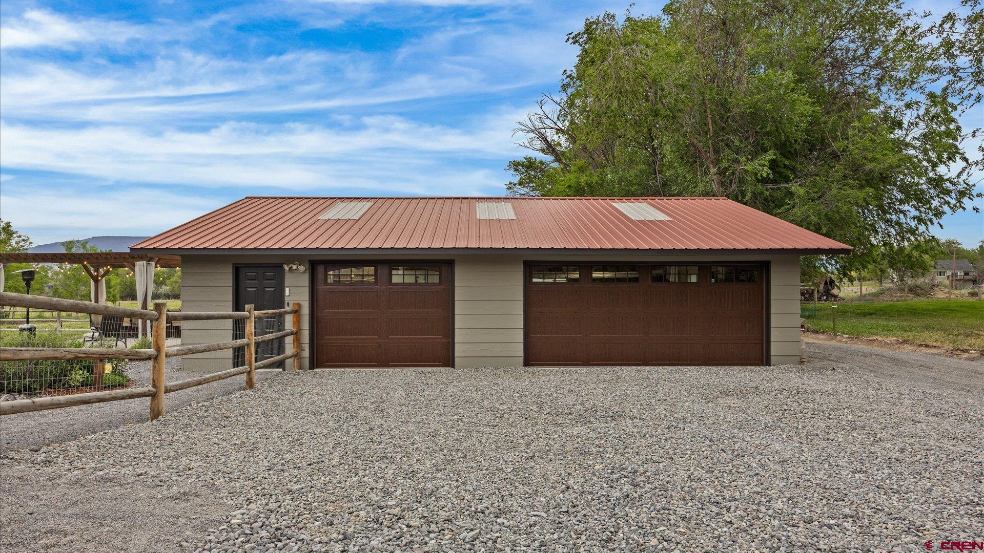 1761 G Road Delta, CO 81416 - Photo 38 of 43 a front view of a house with a yard