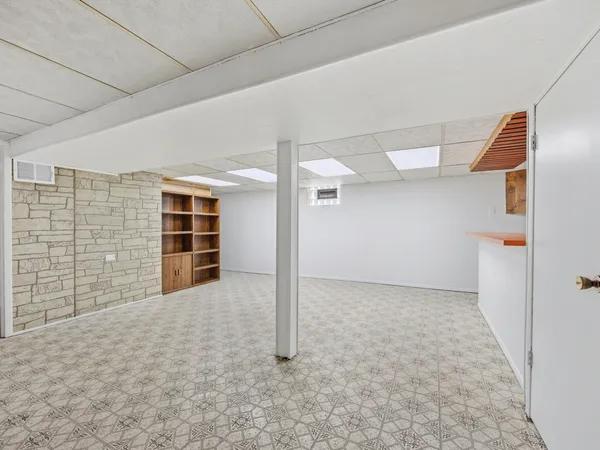 a view of empty room with a window