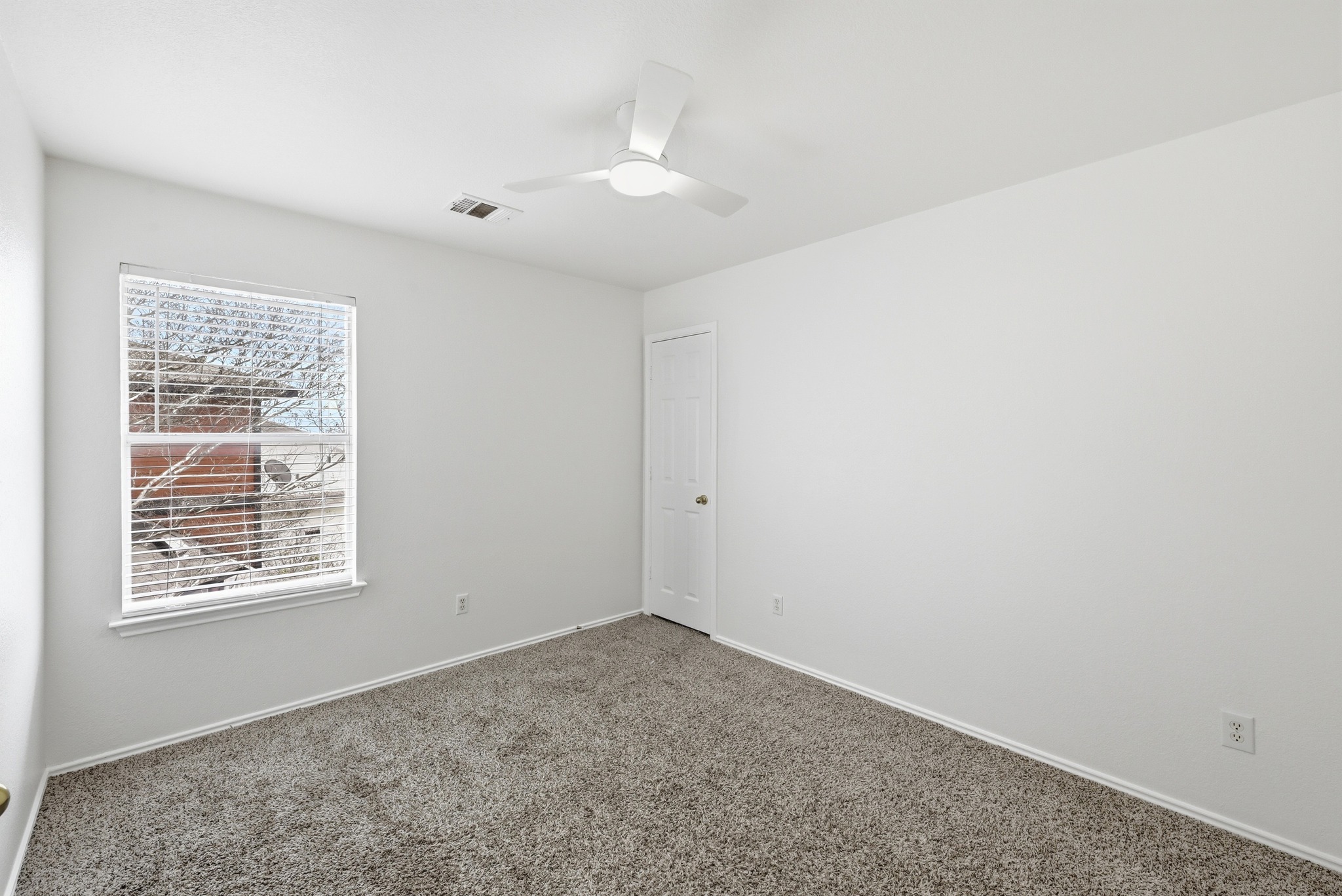 332 Wetzel Kyle, TX 78640 - Photo 16 of 31 an empty room with windows