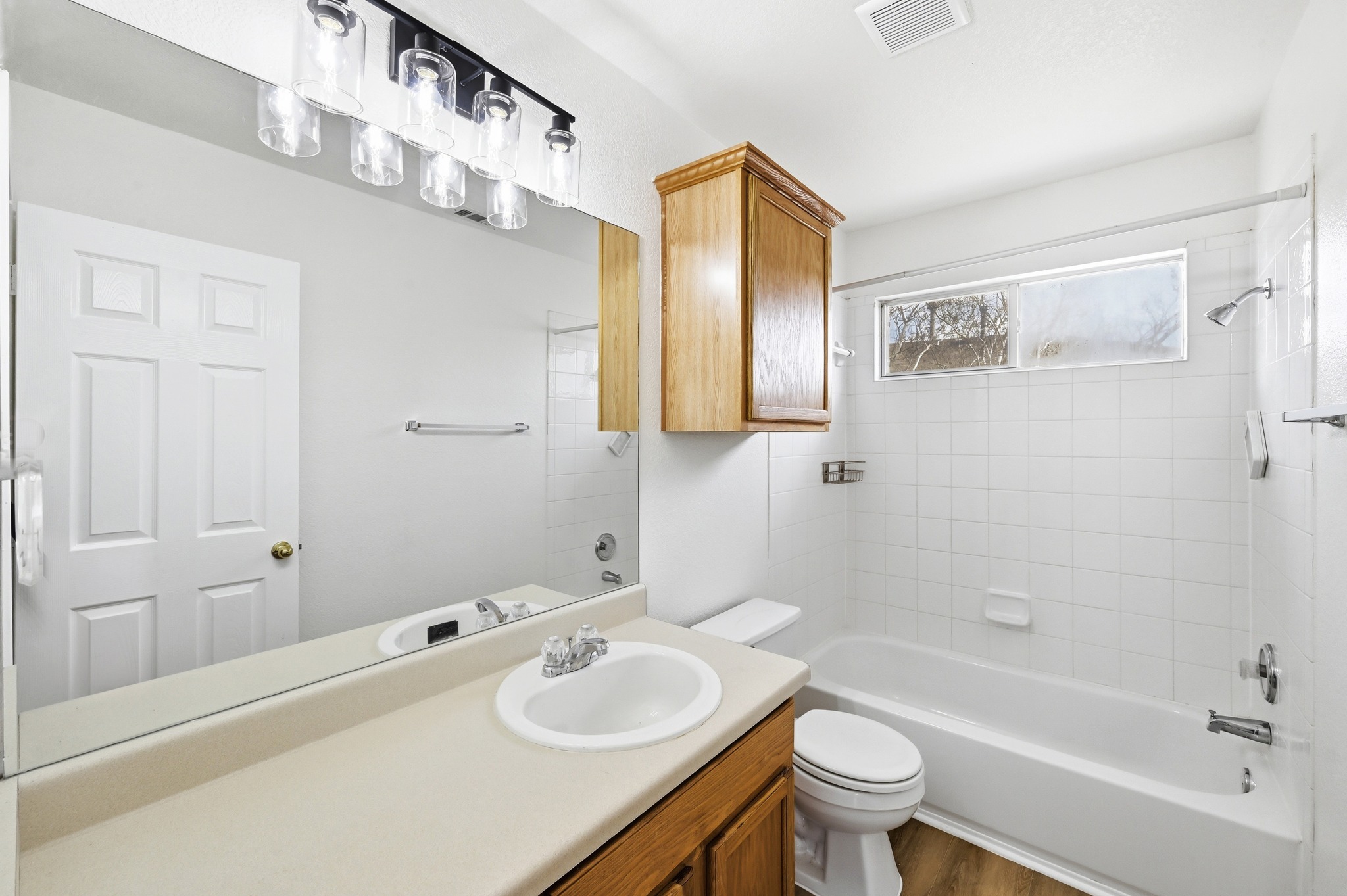 332 Wetzel Kyle, TX 78640 - Photo 18 of 31 a bathroom with a sink a toilet and shower