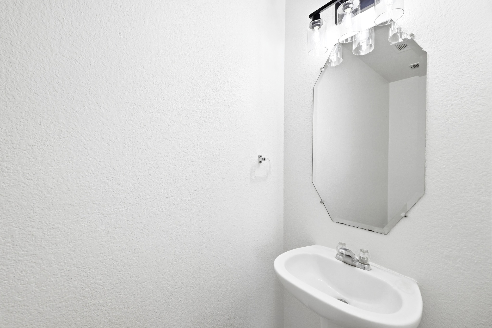 332 Wetzel Kyle, TX 78640 - Photo 19 of 31 a bathroom with a sink and a mirror