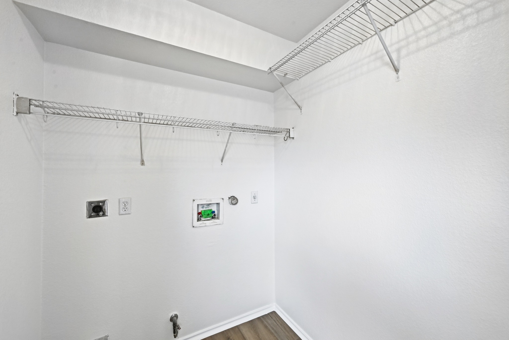 332 Wetzel Kyle, TX 78640 - Photo 20 of 31 a view of small space with racks on the wall